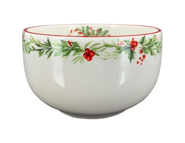 Grand bol en porcelaine avec décors de sucres d'orge et houx sur le contour du bol. Diamètre : 18cm